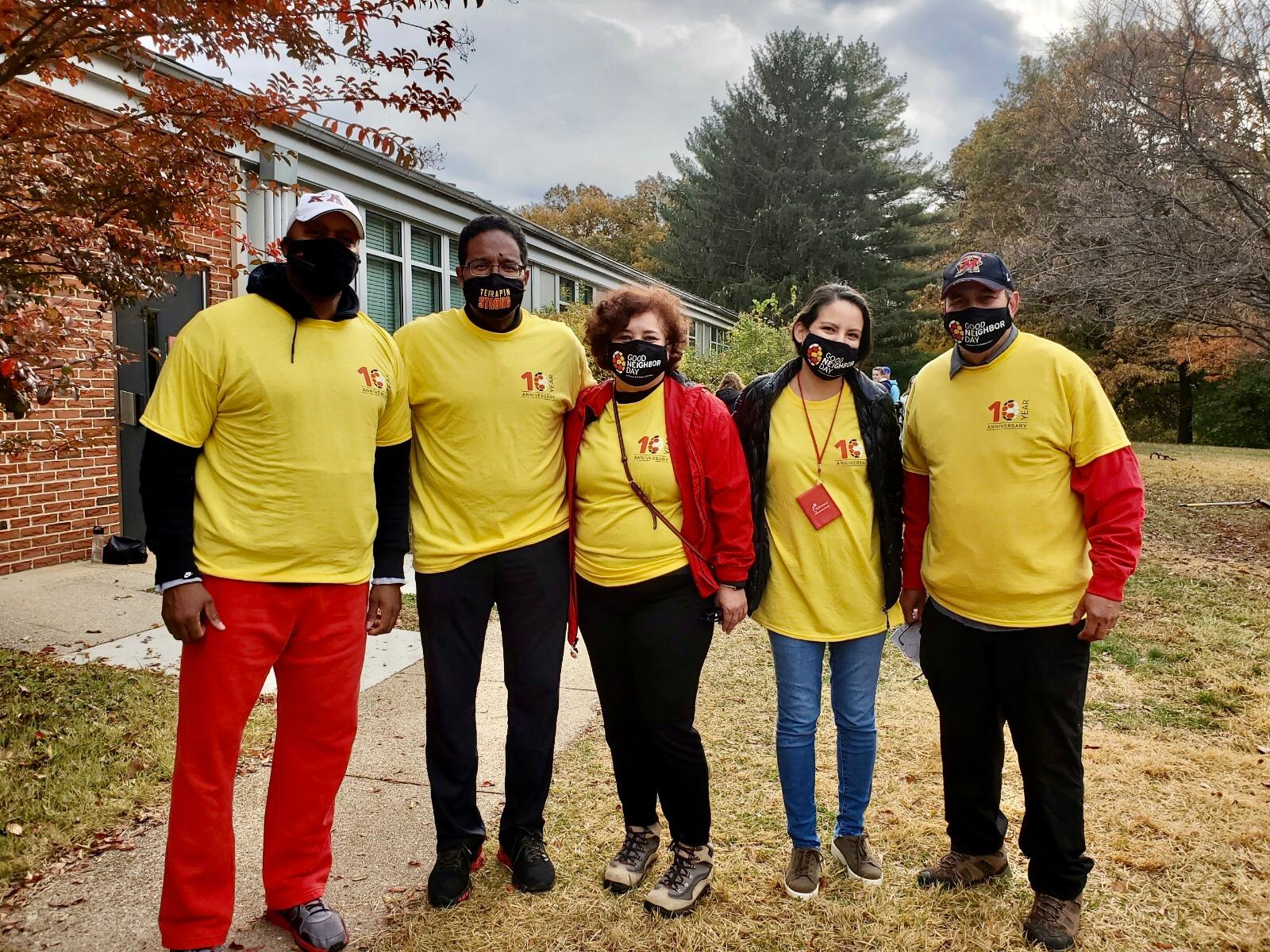 Five Good Neighbor Day Volunteers standing next to each other.