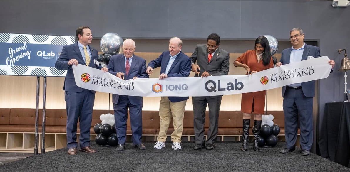 Celebrating the QLab's opening by cutting ribbon.