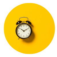 Alarm clock on a circular yellow background