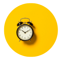 Alarm clock on a circular yellow background